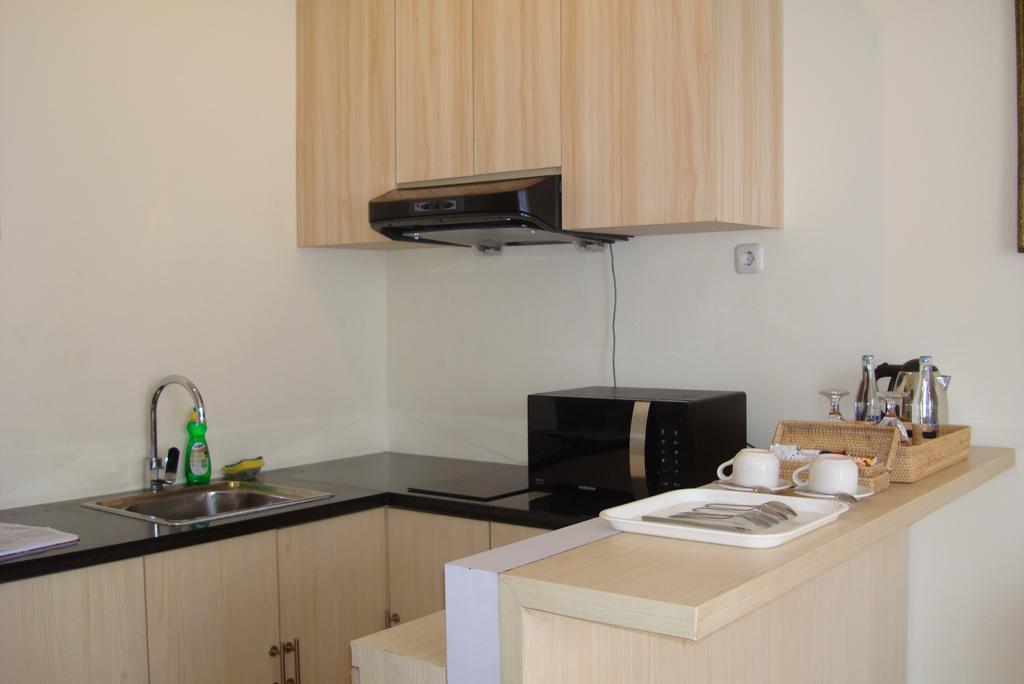 Ap Suite Apartment กูตา ภายนอก รูปภาพ