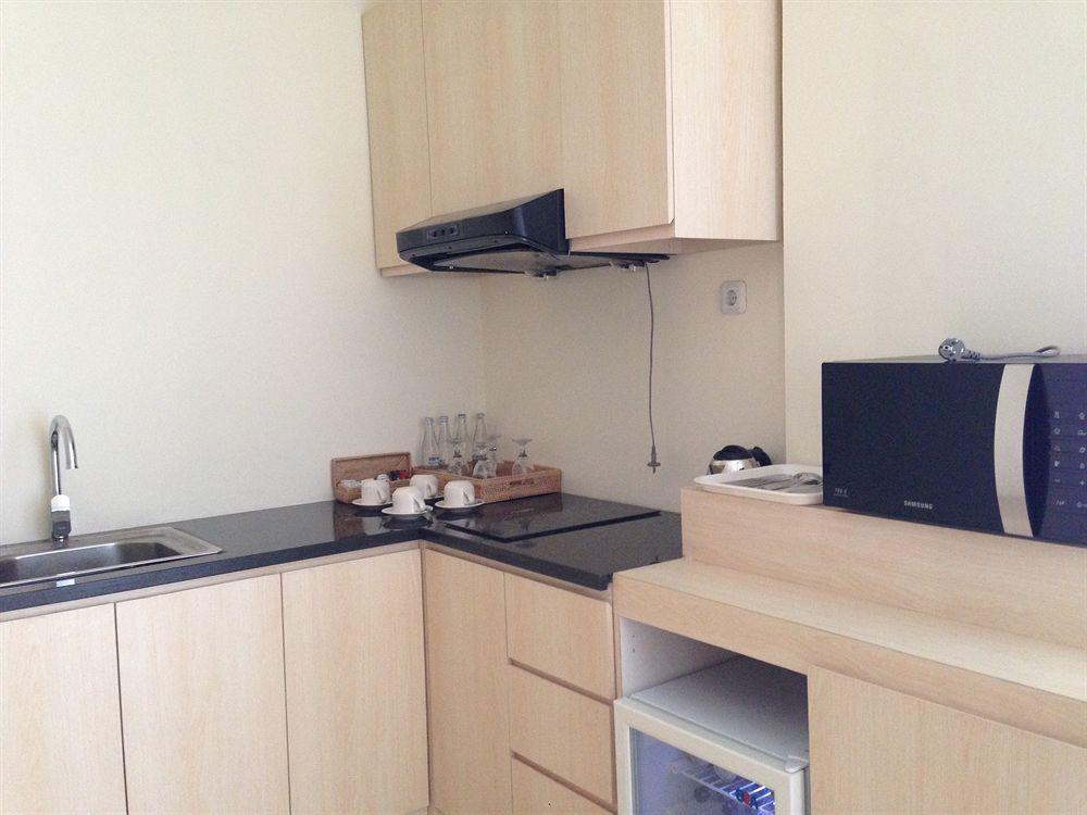 Ap Suite Apartment กูตา ภายนอก รูปภาพ