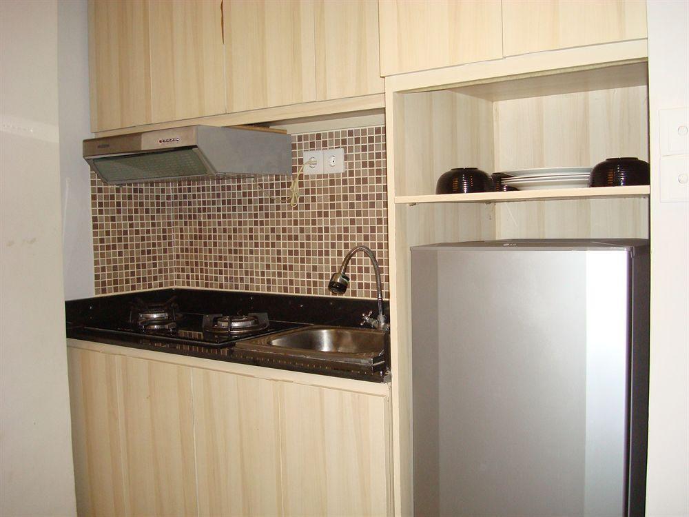 Ap Suite Apartment กูตา ภายนอก รูปภาพ