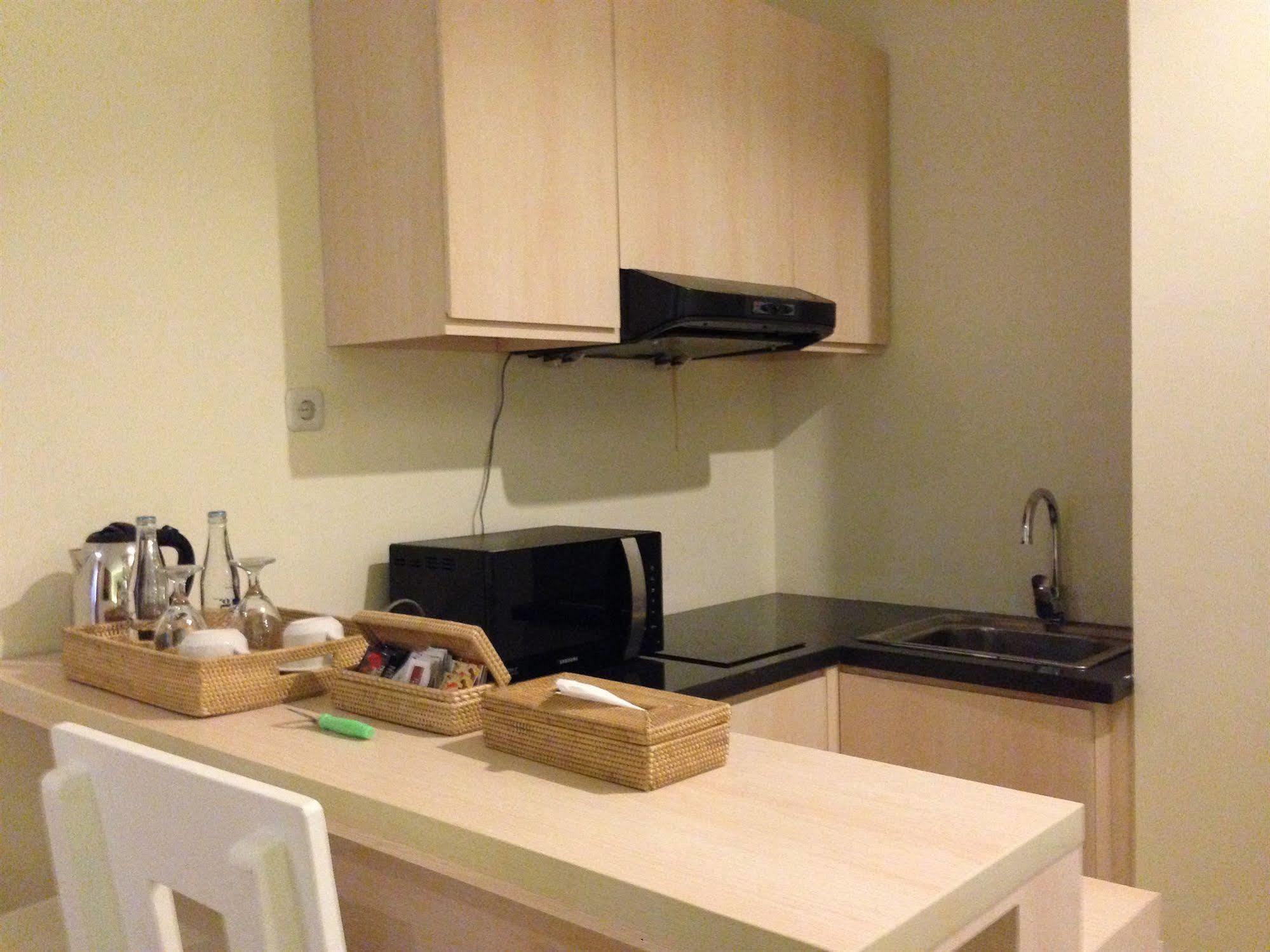 Ap Suite Apartment กูตา ภายนอก รูปภาพ